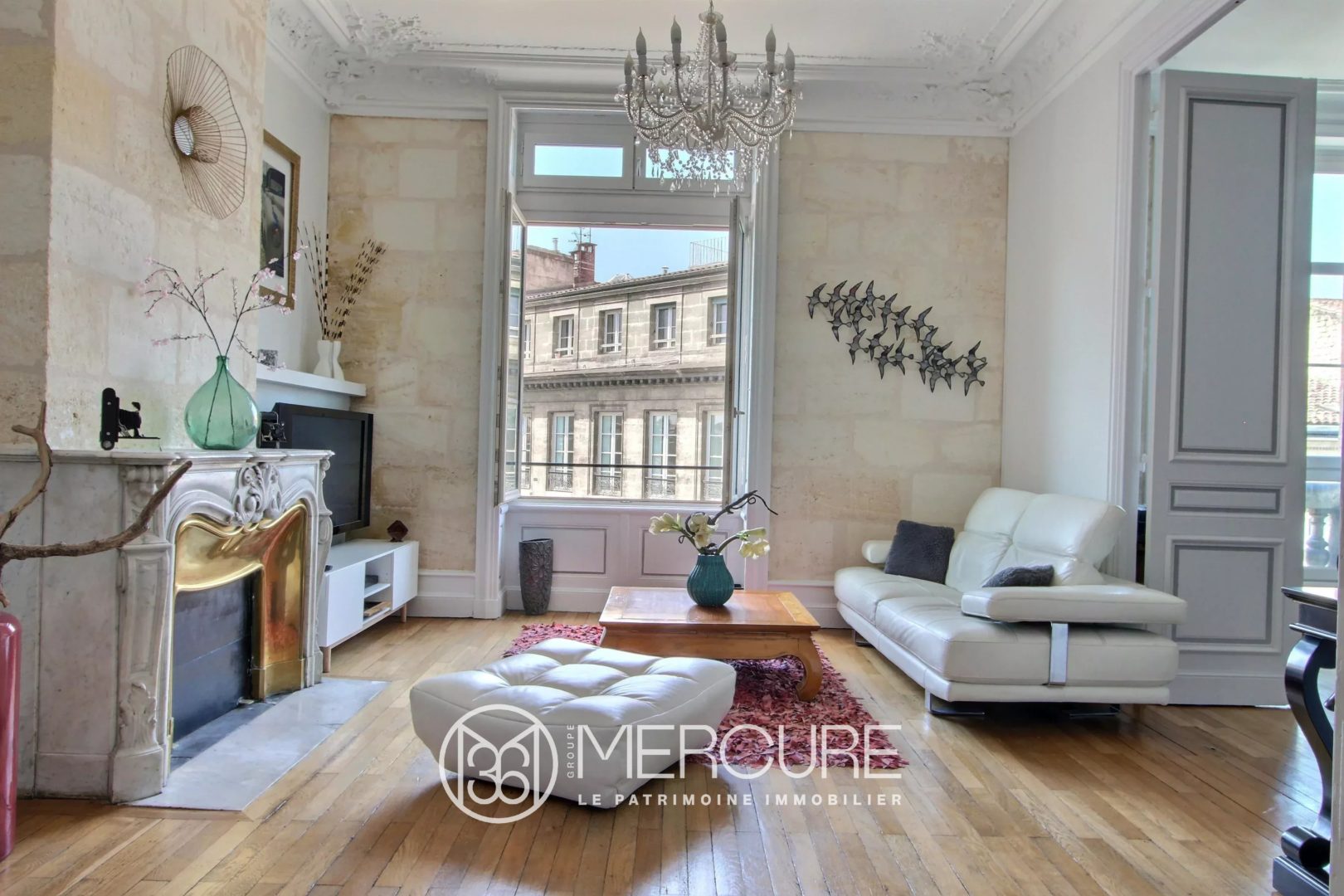 Appartement haussmannien en pierres apparentes